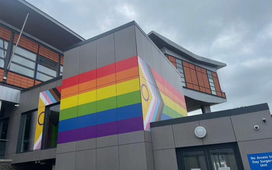 Giant Pride flag painted on hospital